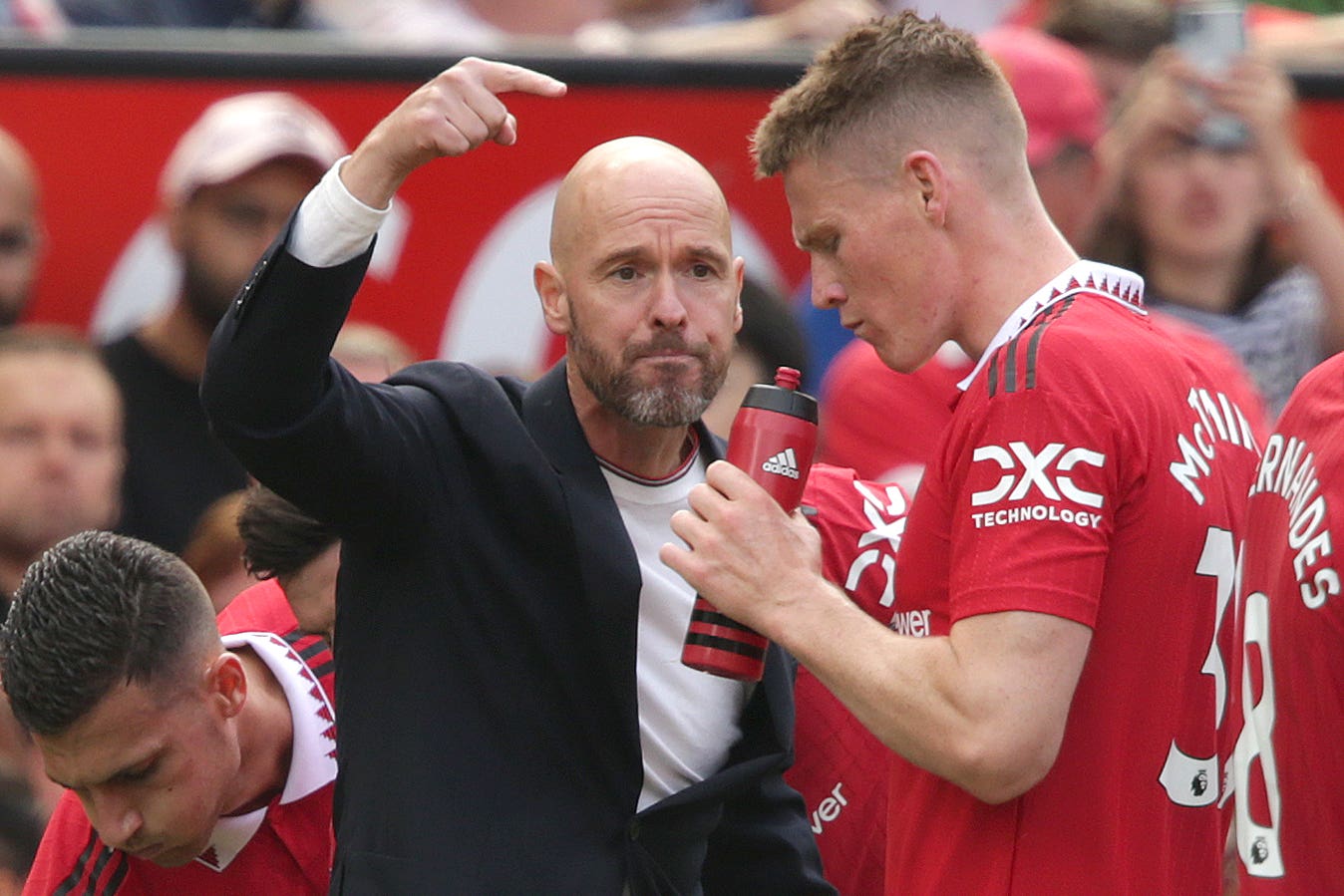 Scott McTominay and Erik ten Hag in conversation.